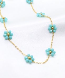 Ατσάλινο χρυσό κολιέ τσόκερ με τιρκουάζ λουλούδια